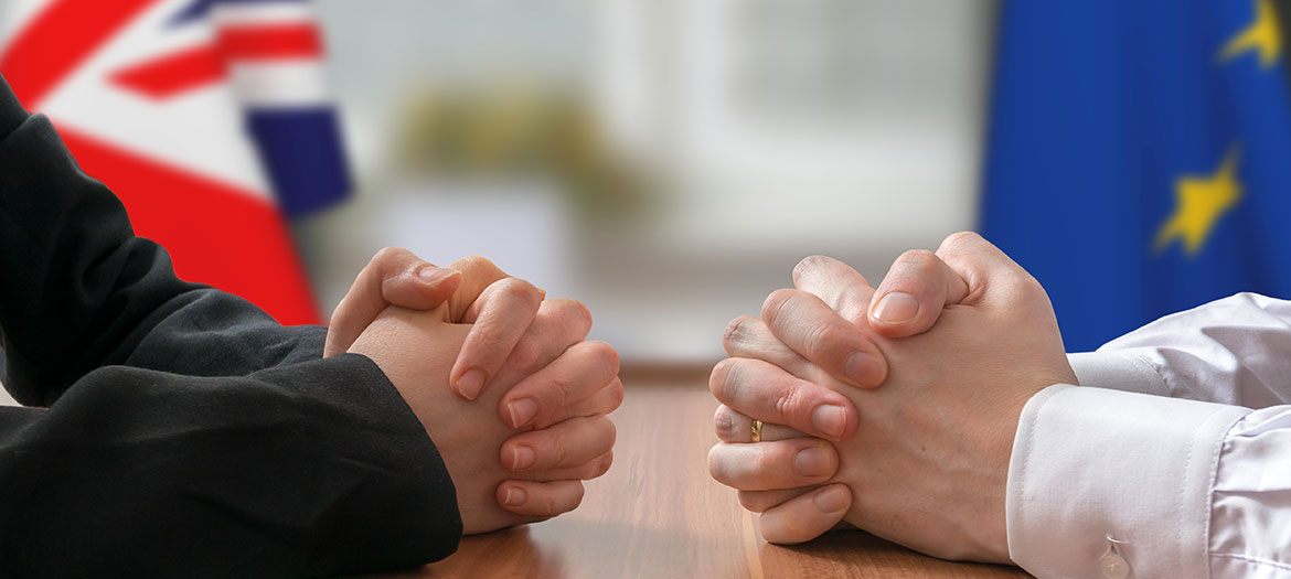 brexit-negotiations-hands-folded.jpg